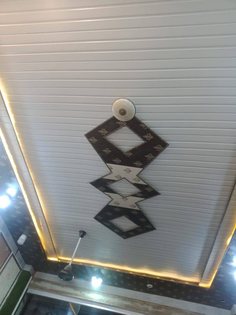 pvc wall panel. Wallpaper sheet. vinyl & wood flooring. ceiling. gras 1