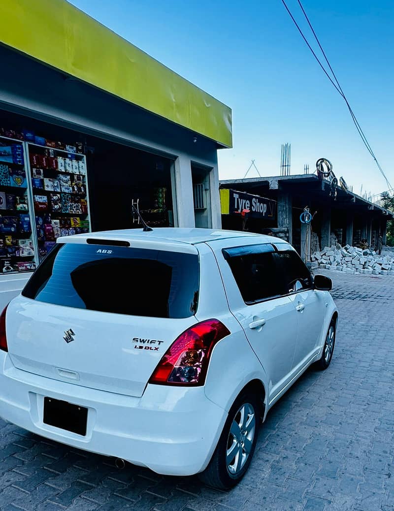 Suzuki Swift 1.3 DLX 7