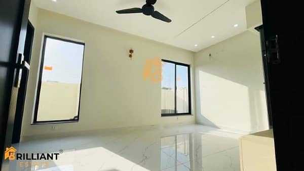 10 Marla Brand New Modern House For Sale in Phase 7 Near Fairways Commercial & DHA Raya Club 13