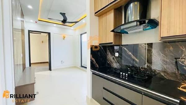 10 Marla Brand New Modern House For Sale in Phase 7 Near Fairways Commercial & DHA Raya Club 22
