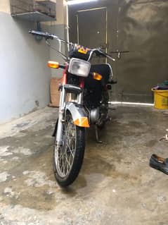Honda 70 2011 model registered in 2012 karachi number