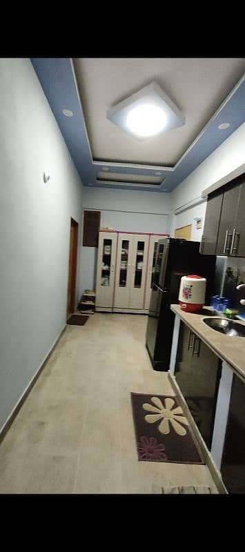 Fully Furnished 70 Sq Yd Flat - 3 Rooms + Kitchen + 2 Bathrooms 10