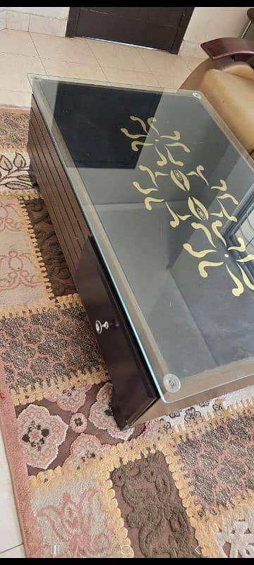 Modern center table with glass top 1