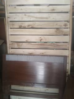 2 wooden single bed