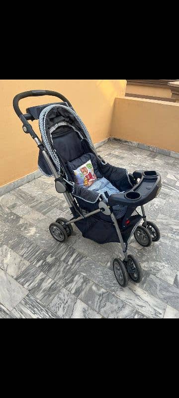 Imported baby pram,walker and carrycot 1