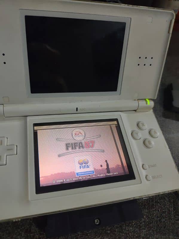NINTENDO DS LITE WITH 2 CARTS ORIGINAL CHARGER POUCH BUILTIN GAME CART 8