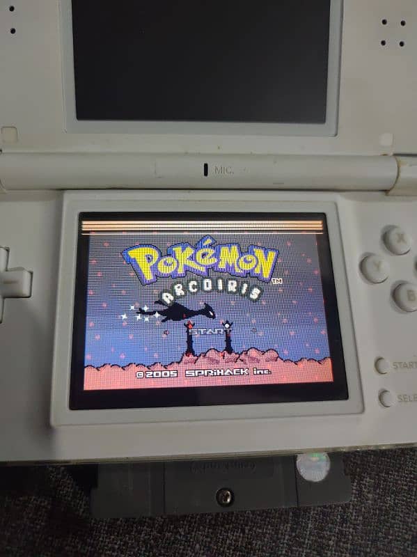NINTENDO DS LITE WITH 2 CARTS ORIGINAL CHARGER POUCH BUILTIN GAME CART 10
