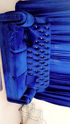 5 seater sofa blue color with curtain. ryk