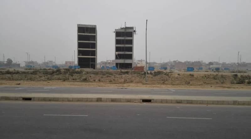 Hot Deal! 4 Marla Commercial Plot in DHA Phase 4 Nearby DD-72 Build Your Future in the Heart of Lahore! 0