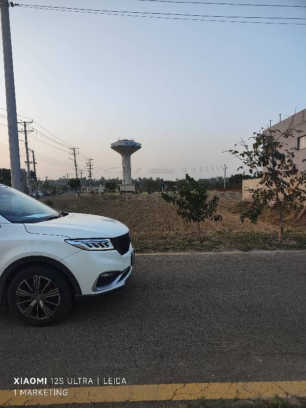 10 Marla prime plot for sale near park and main boulevard. 3