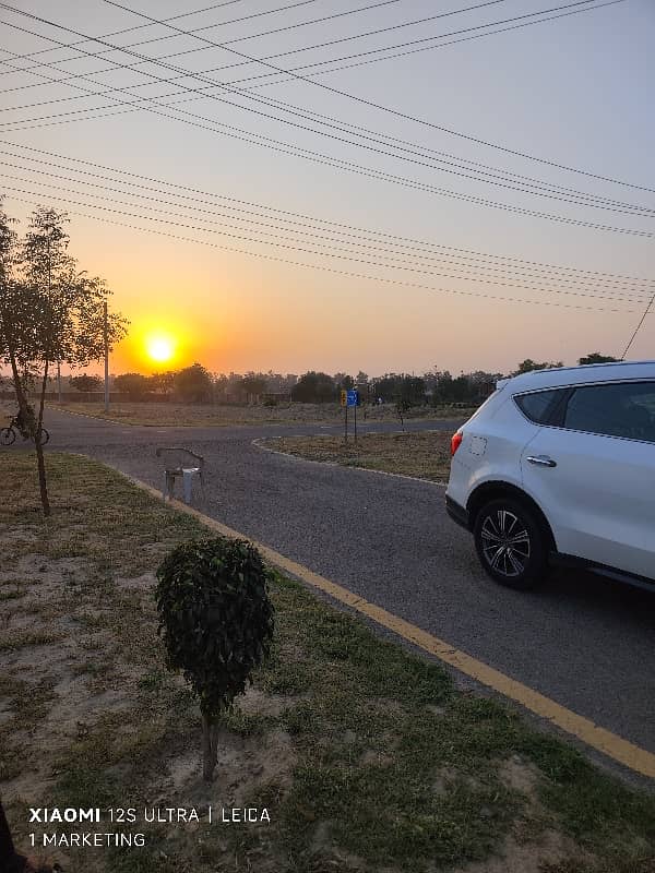 10 Marla prime plot for sale near park and main boulevard. 4