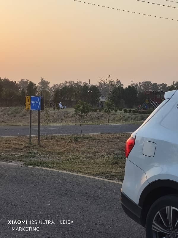 10 Marla prime plot for sale near park and main boulevard. 5