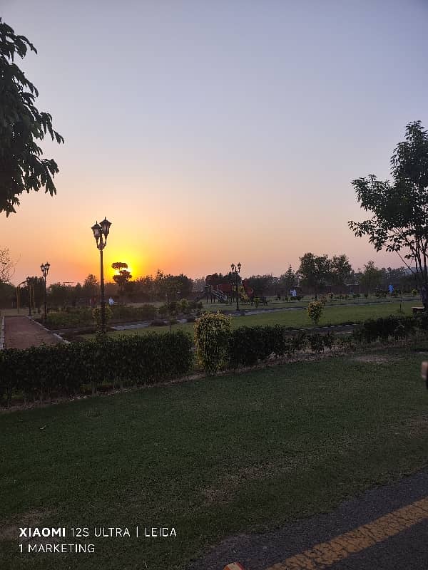 10 Marla prime plot for sale near park and main boulevard. 8