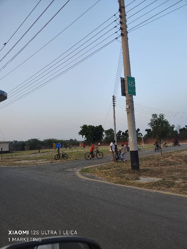 10 Marla prime plot for sale near park and main boulevard. 9
