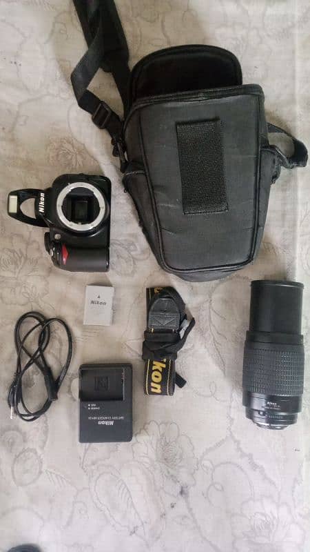 Nikon d3100 with 70/300 lense all ok camera cash on deliver avalialbe 1