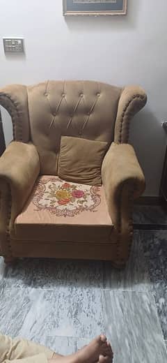 5 seater sofa brown in color.