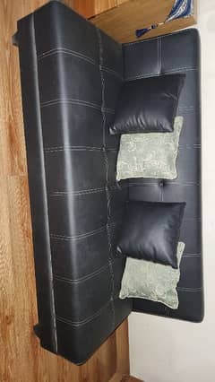 Modern Convertible Sofa Bed with Integrated Storage"to