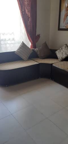 L-SHAPED sitting sofa