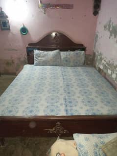 Medium size double bed with mattress condition is ok