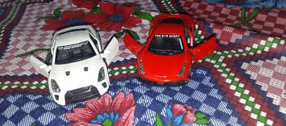 scale model metallic car with open door two car