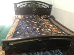 Bed with side table