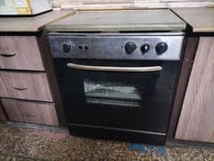 cooking range ( 3 stoves + gas oven for baking)