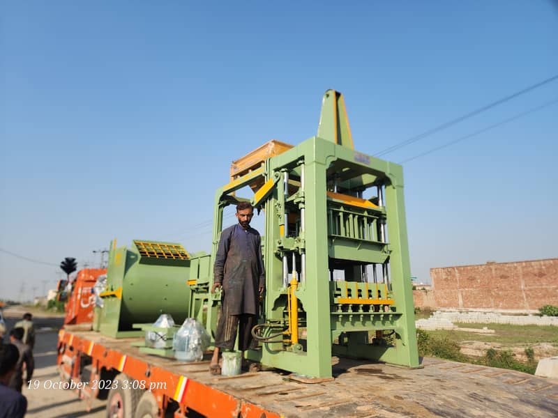 "KM MUGHAL Automatic Concrete Paver Tiles & Block Making Machine 9