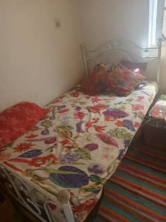 Single bed n glass table available