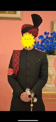 Black sherwani with kulla and khussa