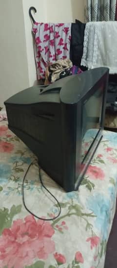 A 21 inches flat screen LG tv