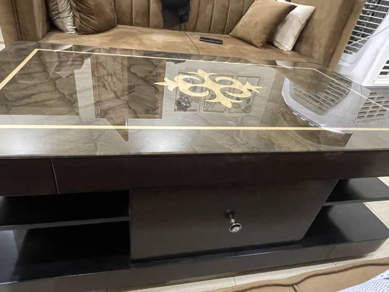 Brown table 3*2 with two draws and shelfs 1
