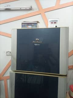 Full size dawlance reflection fridge with steplizer and base stand .
