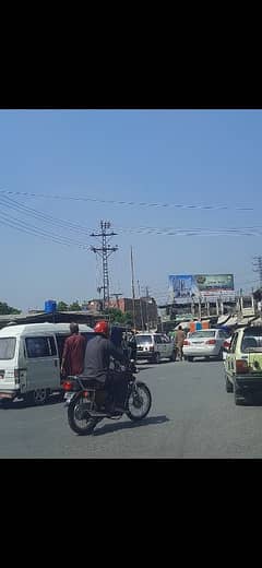 Advertisement board at Bacha Khan Chowk Peshawar Size 15x45 bill board