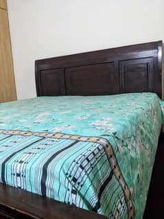 solid wooden bed for sale in best condition