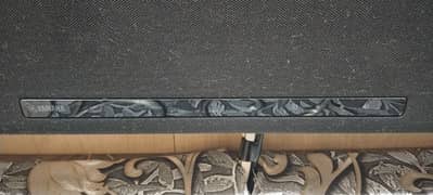 Yamaha sound bar 1080 model include subwoofer