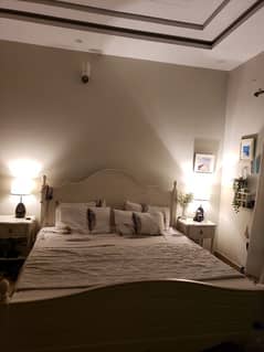 Double bed with side tables