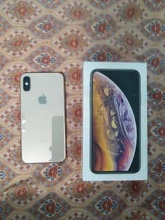 I phone xs 64gb pta Approved gold colour