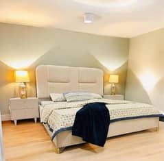 Fully upholstered bed