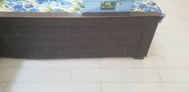Double bed with one side table