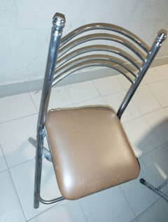 2 chairs one table