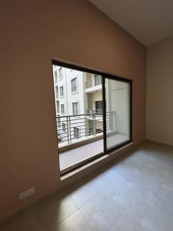 1400sq ft 2BHK Luxurious Apartment in Paragon Towers is available for RENT Near Precinct-17.5min Drive from Main Gate of Bahria Town Karachi 5