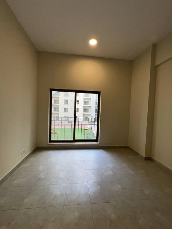 1400sq ft 2BHK Luxurious Apartment in Paragon Towers is available for RENT Near Precinct-17.5min Drive from Main Gate of Bahria Town Karachi 6