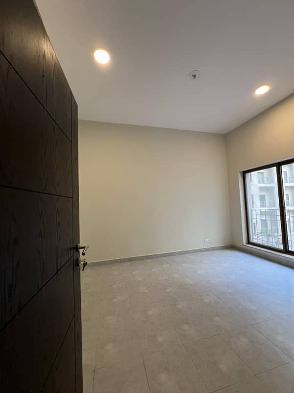 1400sq ft 2BHK Luxurious Apartment in Paragon Towers is available for RENT Near Precinct-17.5min Drive from Main Gate of Bahria Town Karachi 8