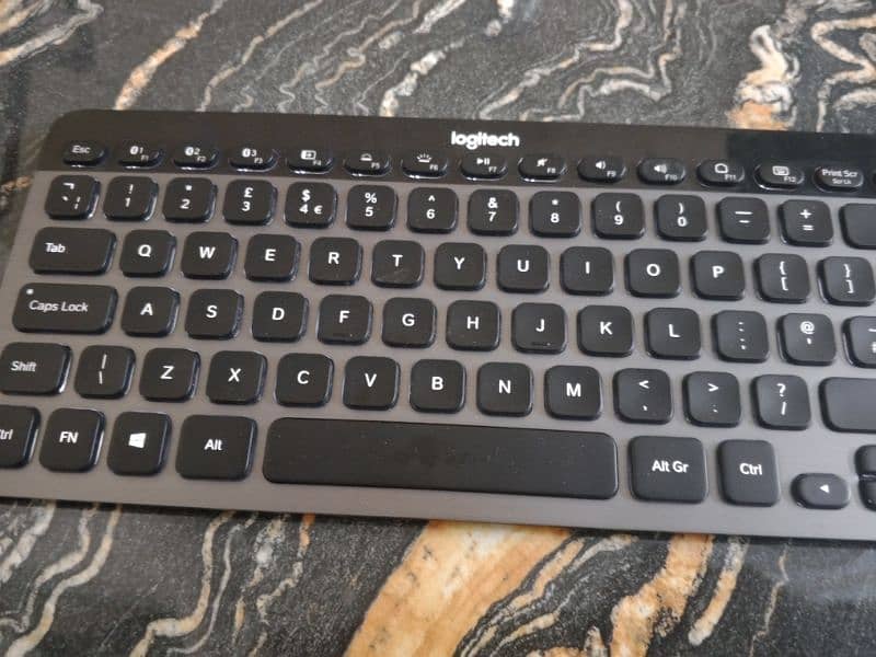 logitech k810 & Mx anywhere 2 moise 1