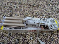 three tube curling iron