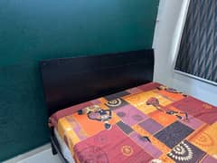 bed with side table