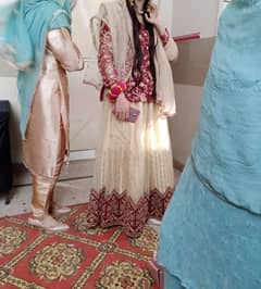 golden n mhroon heavy embroided  lhnga