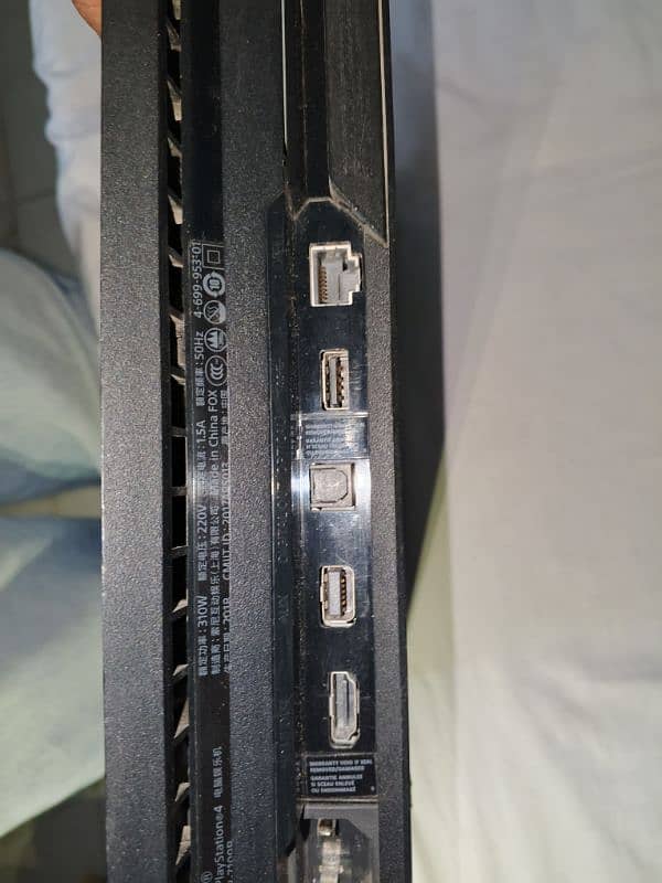 PS4 PRO 1TB With 2 Games and Controllers 3
