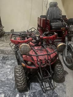 Quad Bike ( 4 Wheeler }