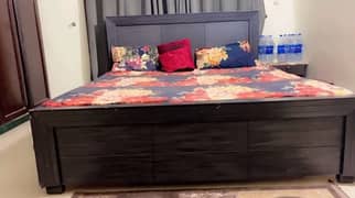 bed with side table